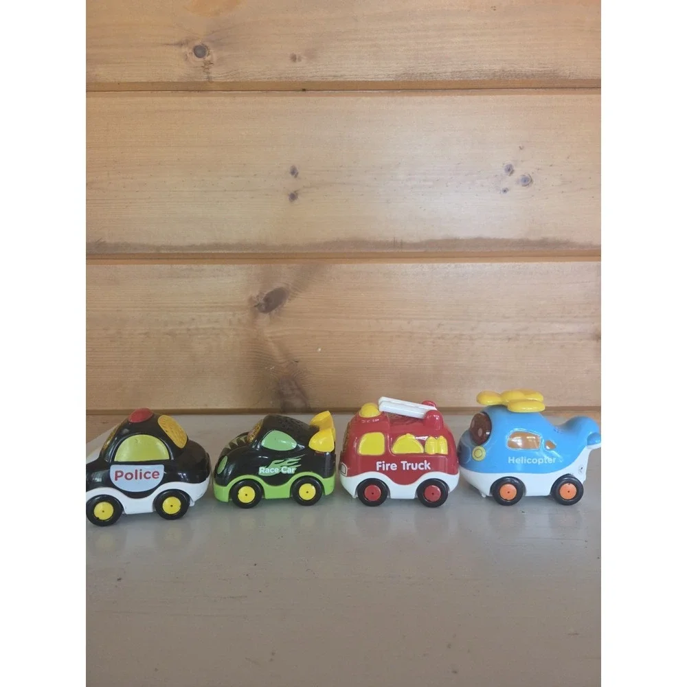 Lot of 4 VTech Go! Go! Smart Wheels Police Car Fire Truck Racecar Helicopter ZB4